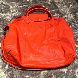 Bright and beautiful Longchamp Le Pliage Cuir Medium in Poppy Red/orange